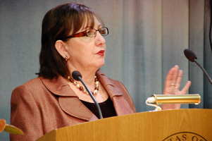 A woman (Seyla Benhabib) talking from a podium.