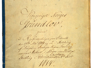 Gulnet, håndskrevet forside til den håndskrevne originalutgaven av Norges grunnlov.