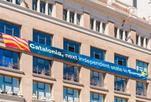 A banner on the side of a building with the text "Catalonia, next independent state in Europe".