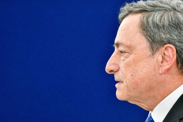 The face of Mario Draghi. he is the President of the European Central Bank. Blue background.