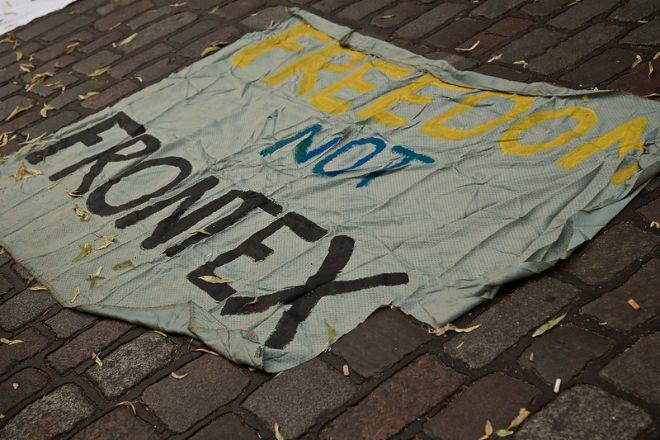 protest banner against frontx