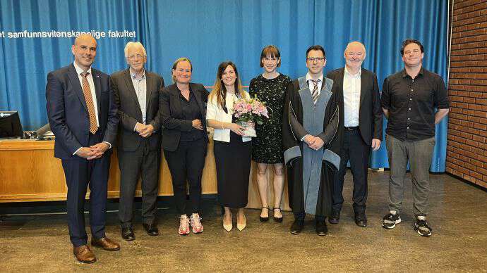 group of people, candidate holding flowers