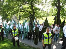 people in a demonstration. police officers around
