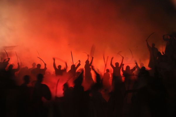 people with their hands in the air