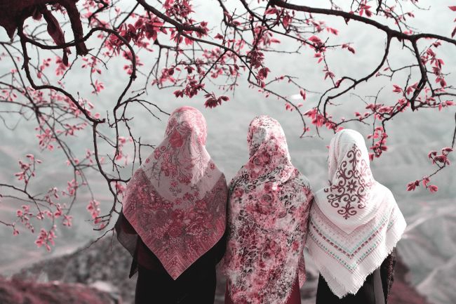 Three women with head scarves