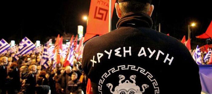 demonstration, greek letters on the back of a shirt