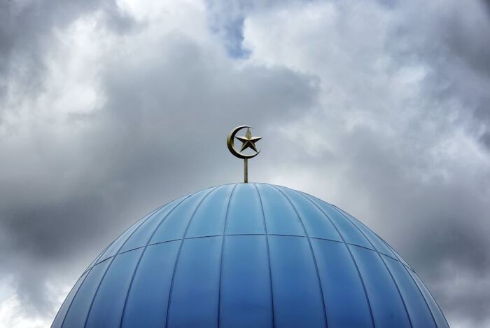 top of a blue dome, moon and star