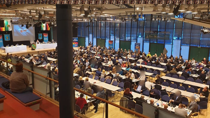 big conference room filled with people