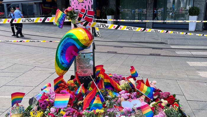 rainbows and flowers on the street to commemorate the losses after the pride terror in oslo