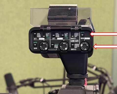 Arrows pointing to the volume adjustment dials on the SONY XLR adapter
