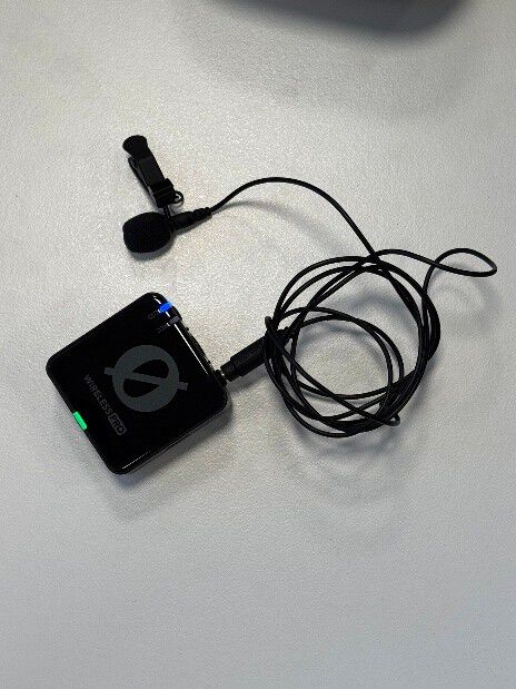 Microphone connected to an extender