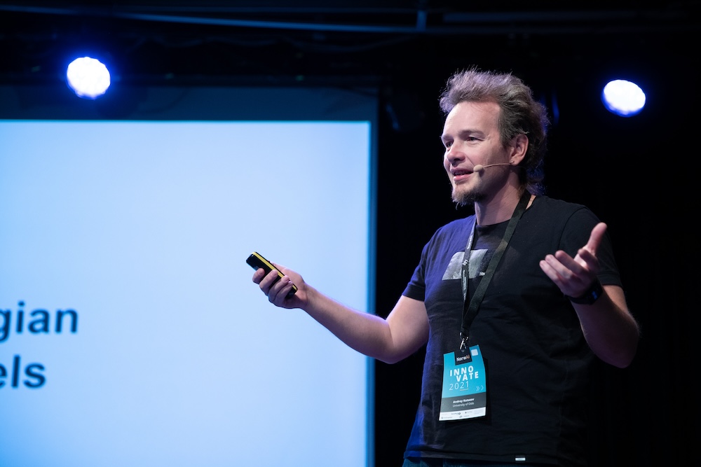 Photo of Andrey Kutuzov giving a presentation. 