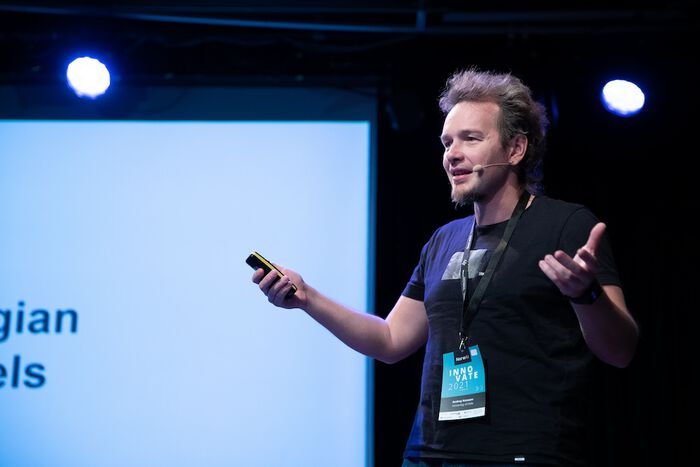 Photo of Andrey Kutuzov giving a presentation. 