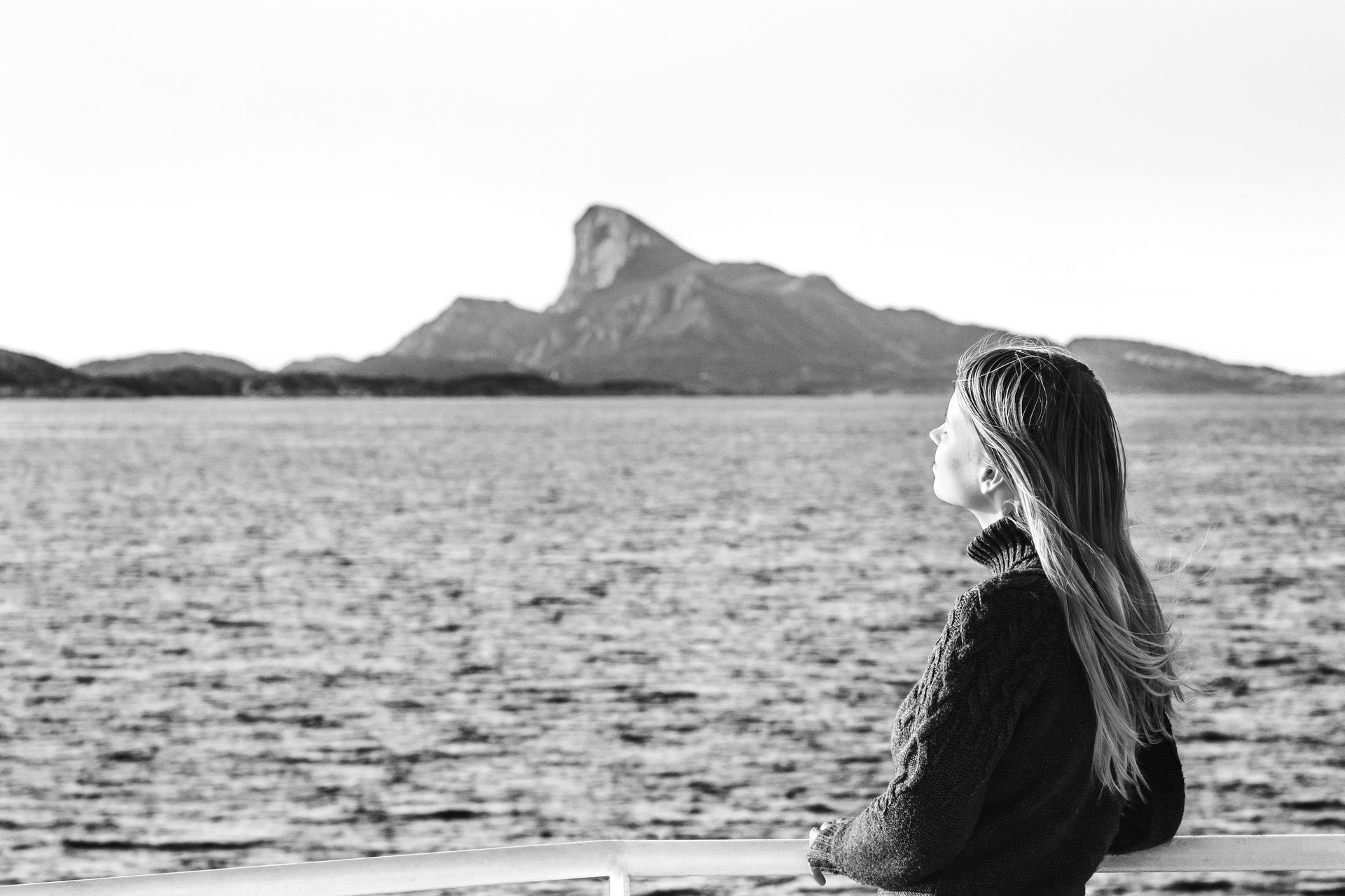 woman looking out over the ocean