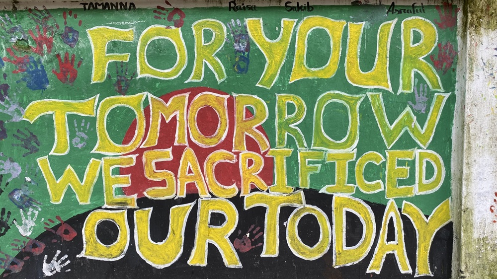 Mural with the writing "For your tomorrow we sacrificed our today"